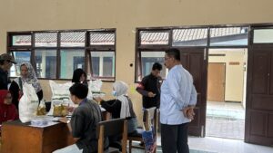 Penyaluran Bantuan Pangan Nasional Beras Bulog dan Minyak Alokasi Februari-Maret 2026 di Kalurahan Sinduharjo